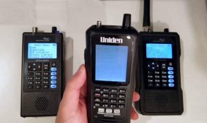 Holding a Police Scanner in Your Hand Holding a Police Scanner in Your Hand